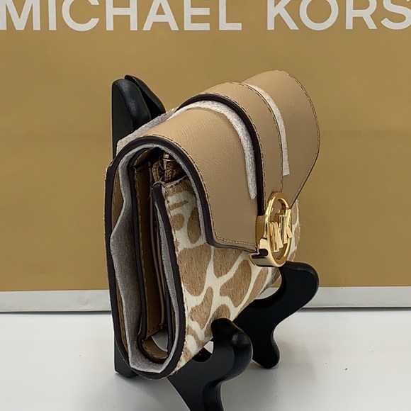 MICHAEL KORS
Carmen Medium Flap Bifold Faux Fur-Leather Wallet
Camel color - Picture 12 of 15